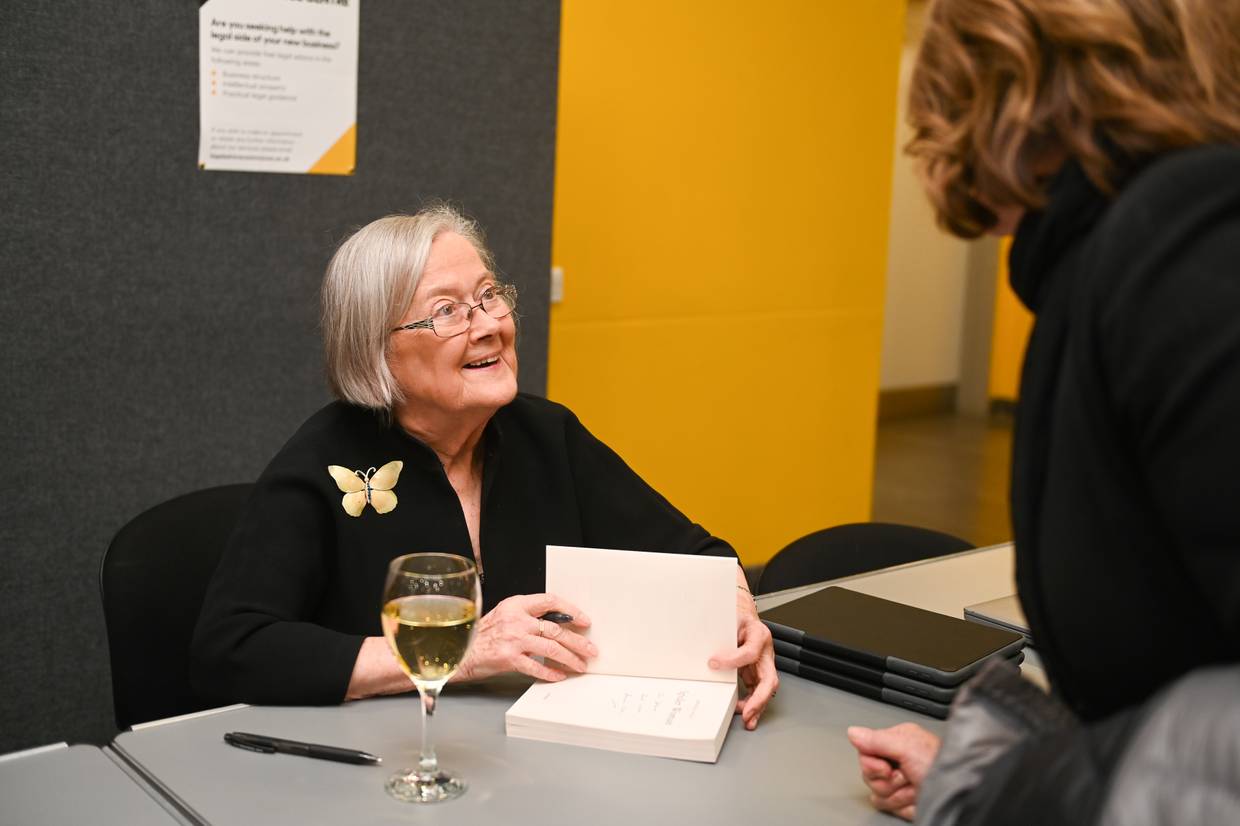 Lady Hale signing books