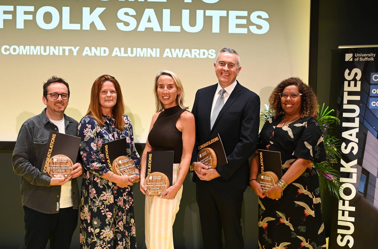 The five Community Award winners lined up on the stage at the Suffolk Salutes awards