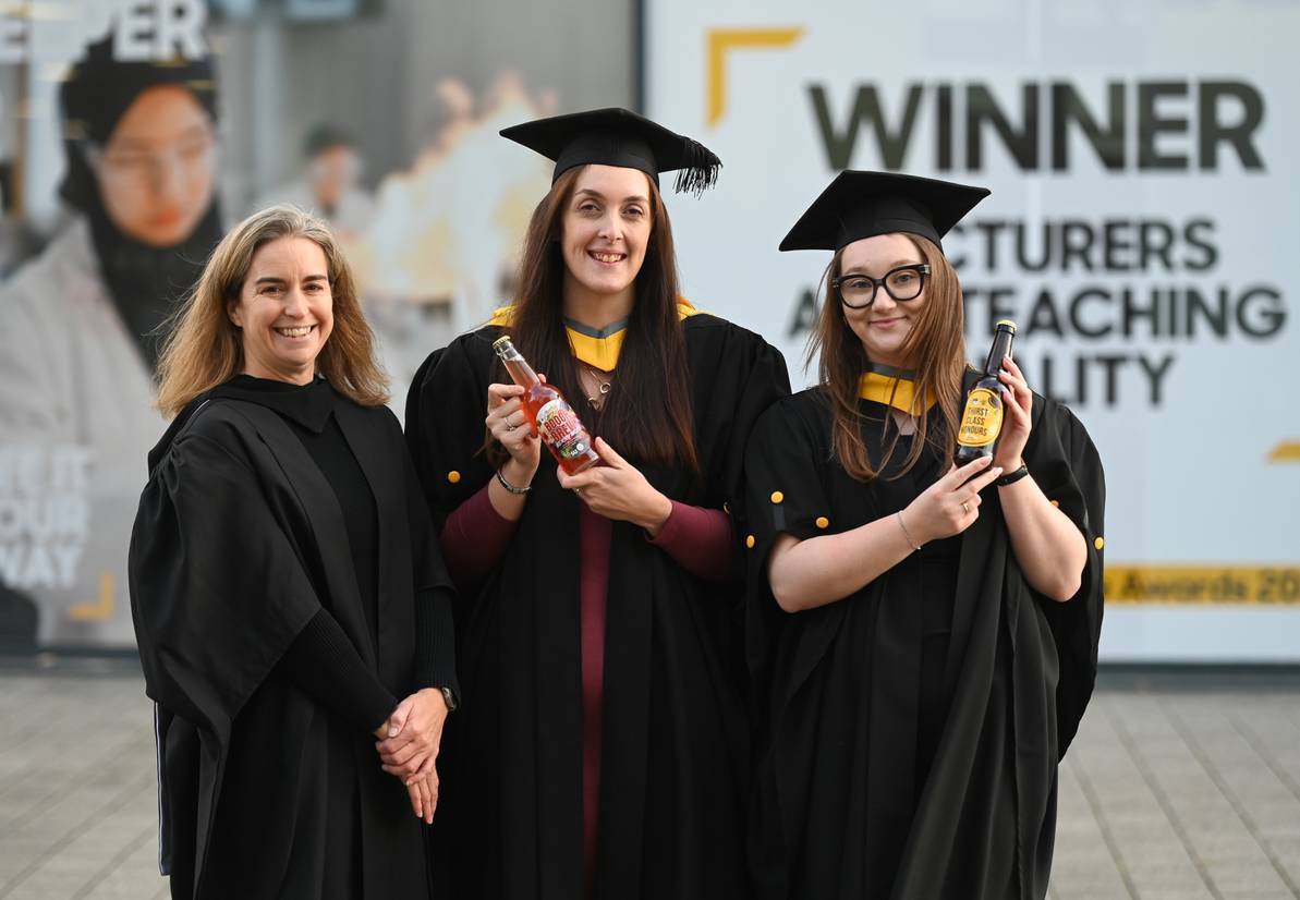 Left to right: Business lecturer Liz Cobbold with graduates Adele Harris and Rebecca Mines