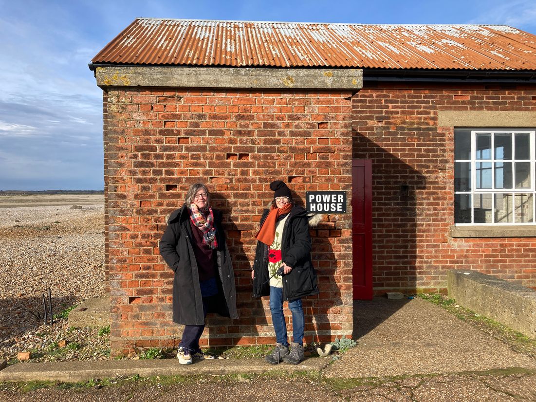 Dr Jane Watt, left, and Dr SE Barnet, right, outside the Power House at Orford Ness, where they hosted the first part of their research project last year.