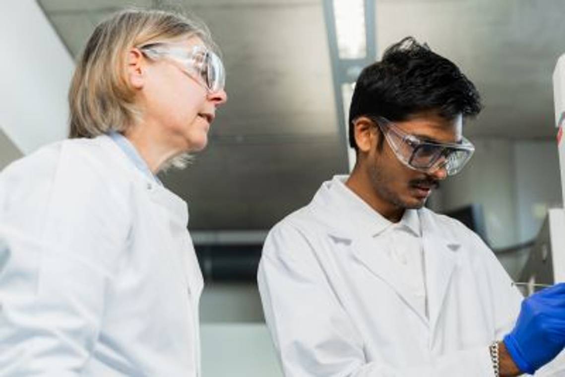 A student in the pharmacy lab with academic