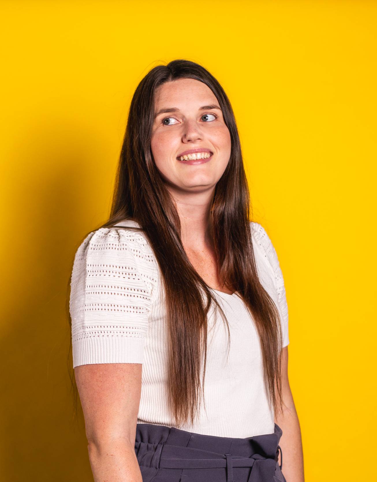 Annabel Goard profile photo on yellow background