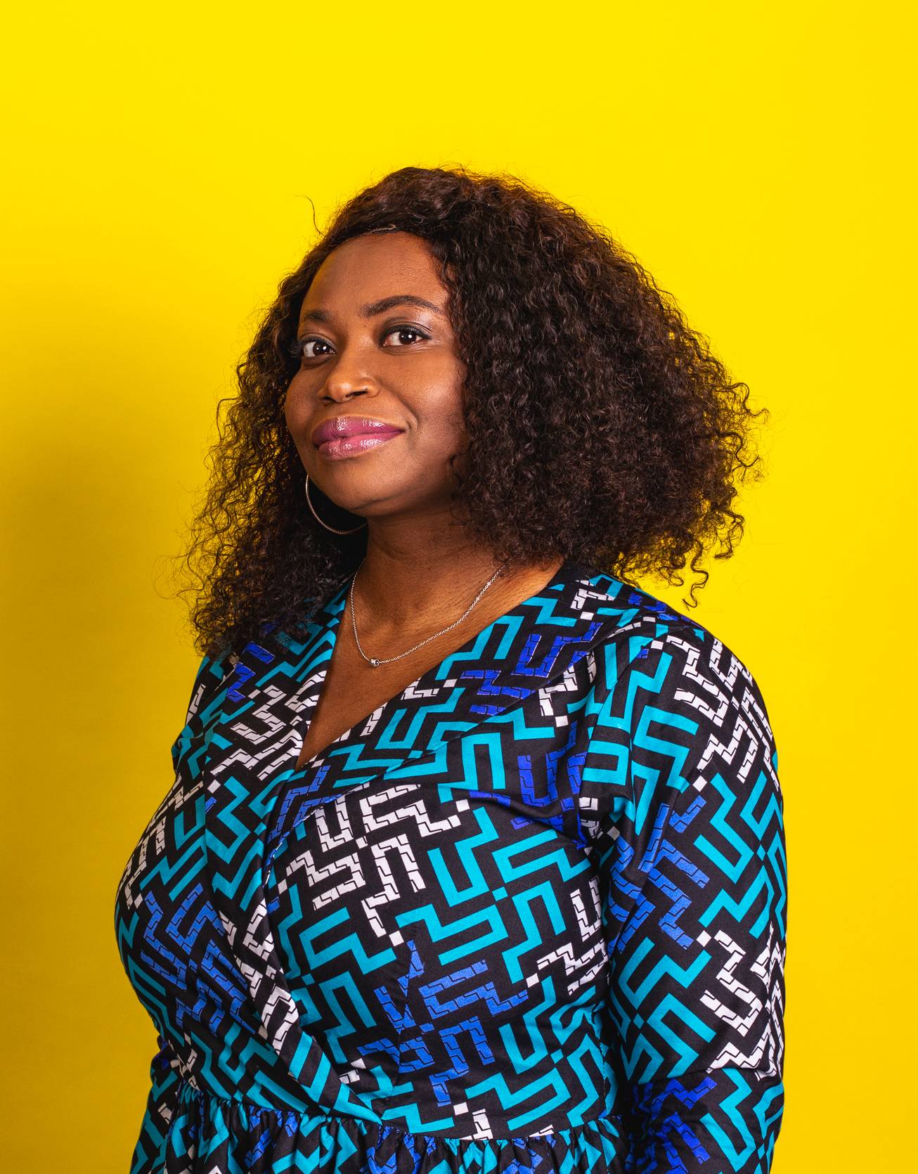 Adetola Adekunle profile photo on yellow background