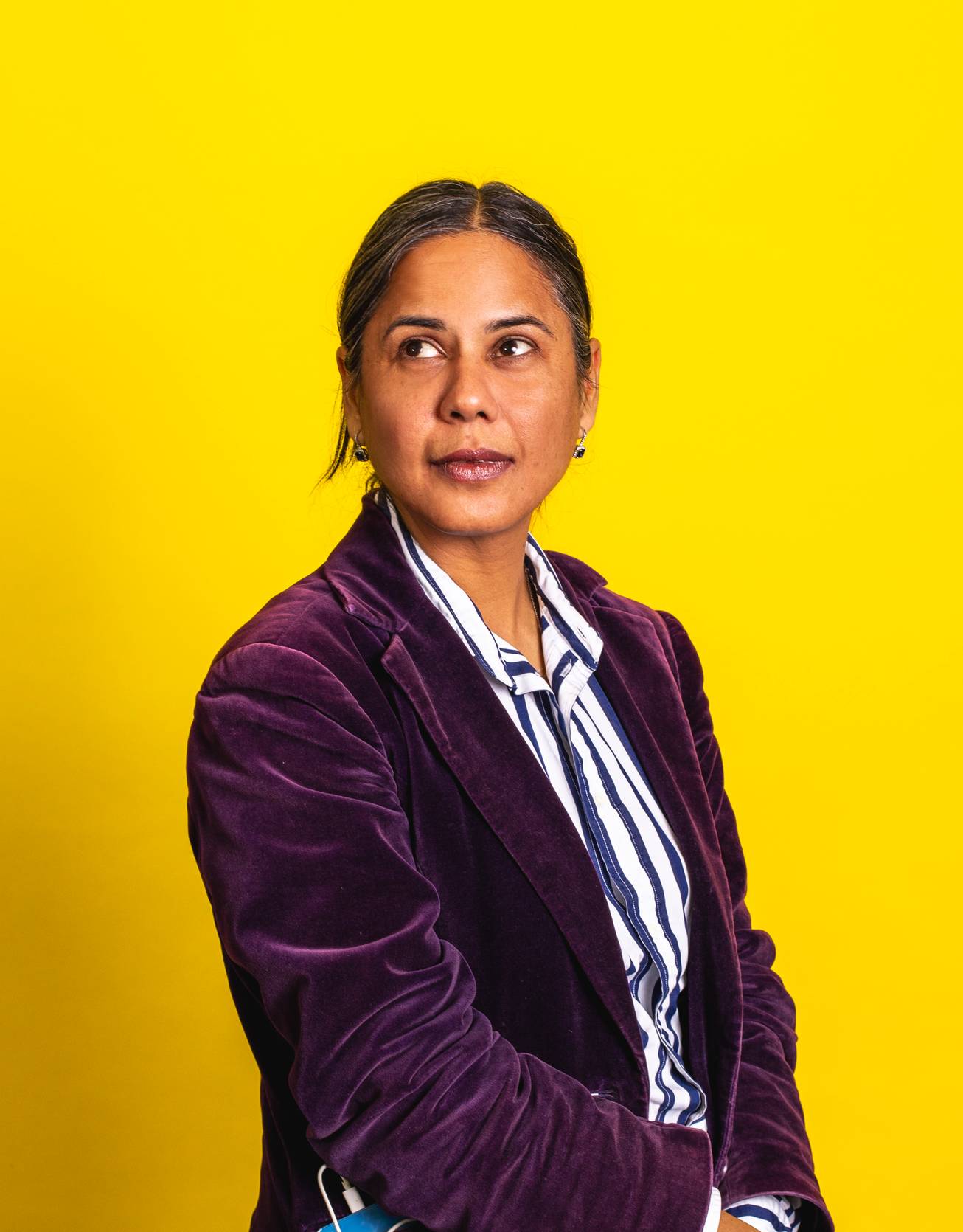 Pallawi Sinha profile photo on yellow background