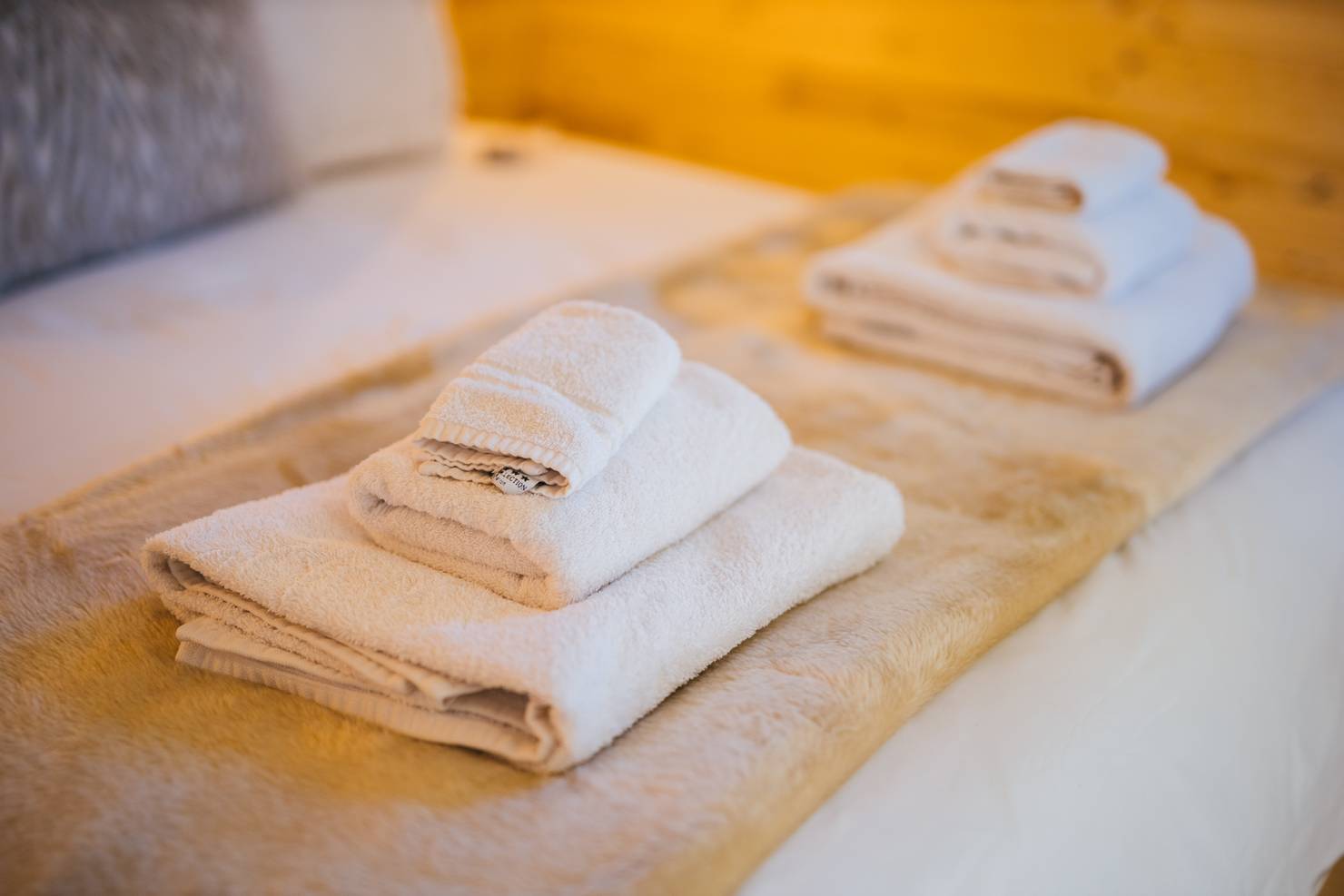 Close-up of towels on a bed