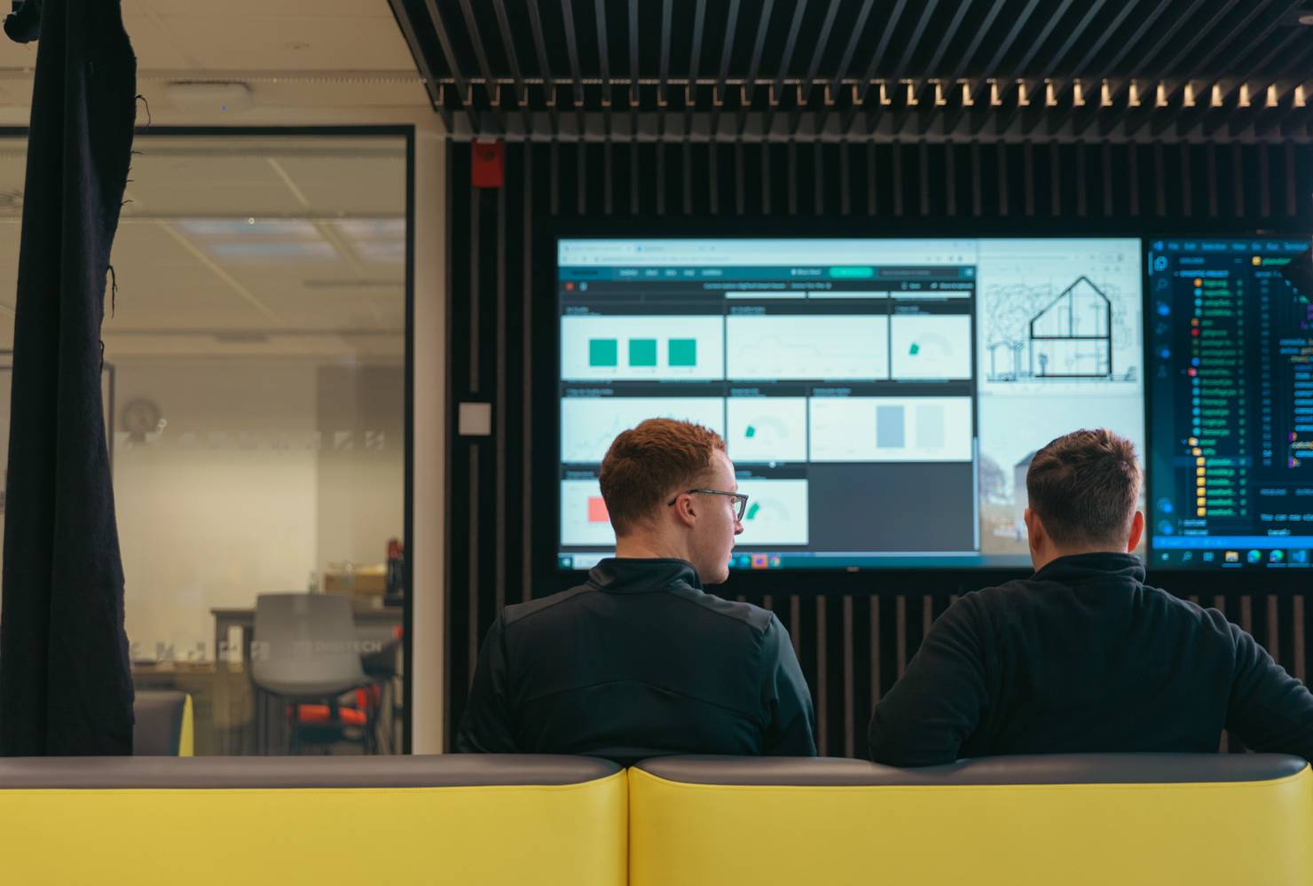 Students in front of hi-tech display screen