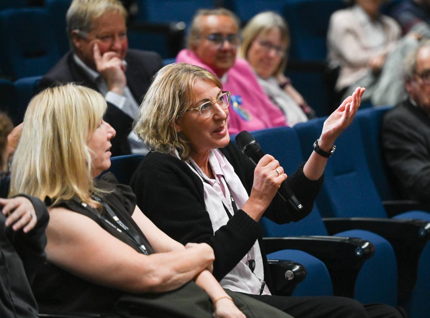 An audience member asking a question at a University of Suffolk Spotlight Suffolk event