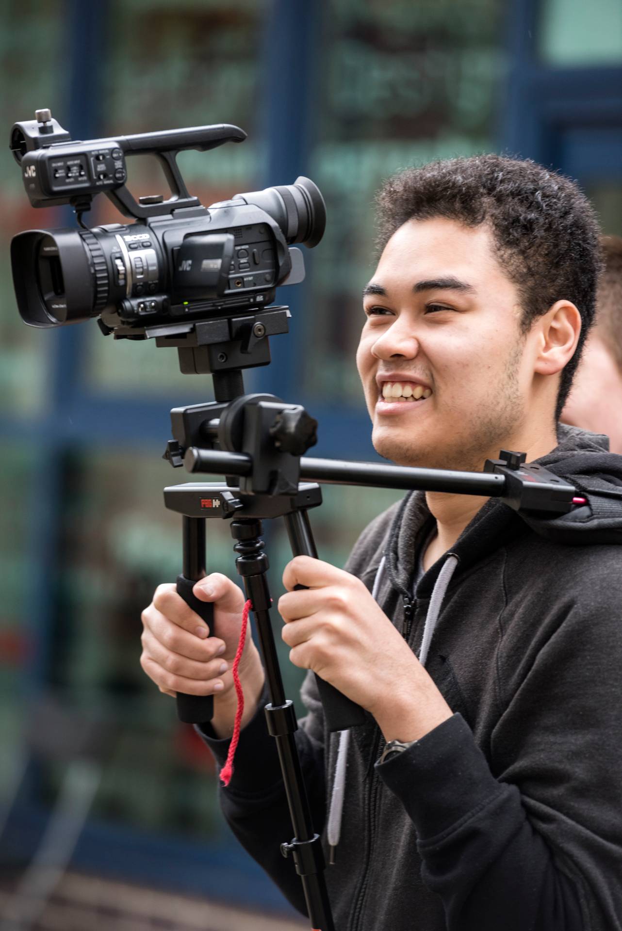 Close-up of student with video camera