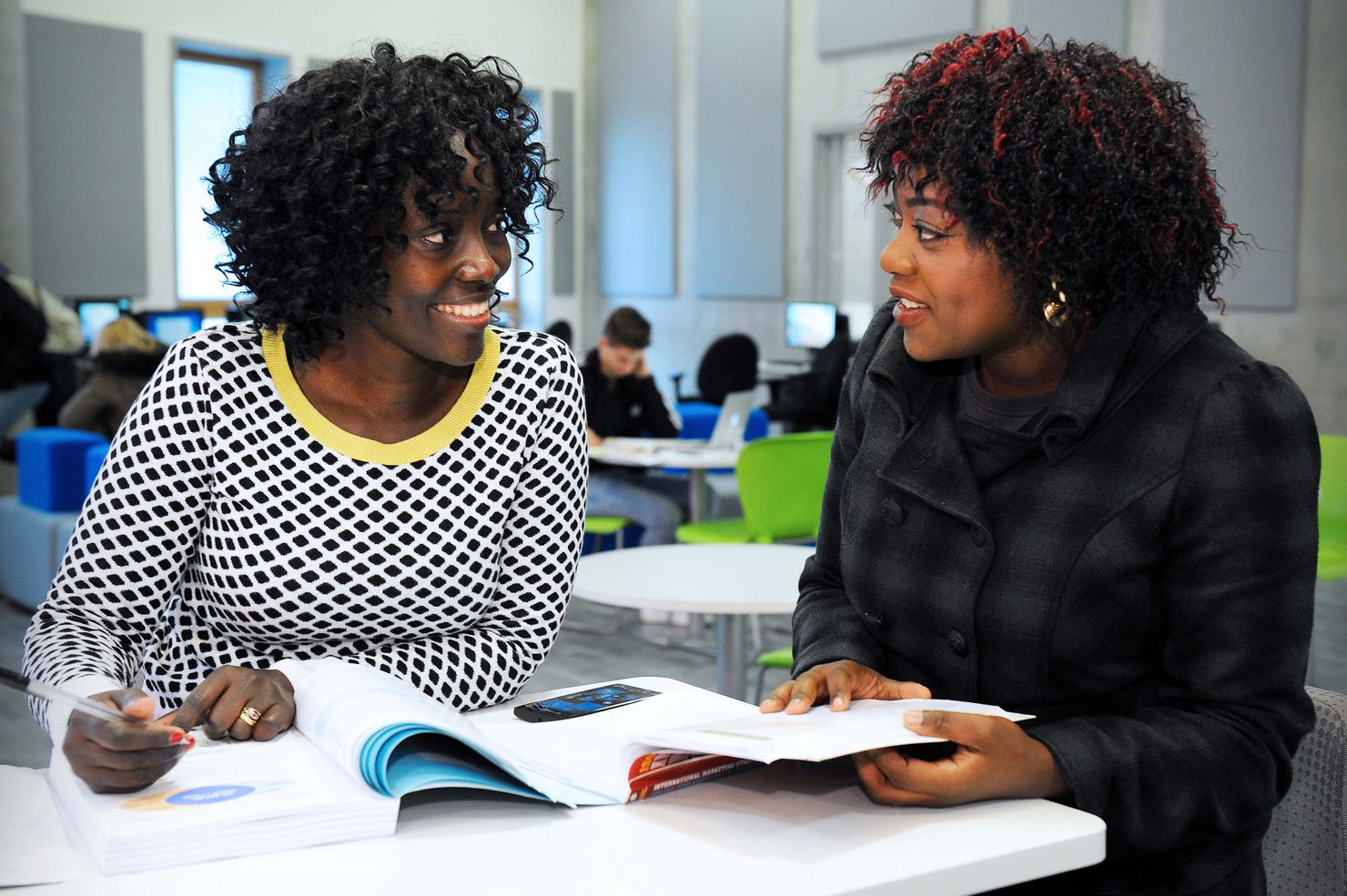 Two students studying in the Waterfront Building