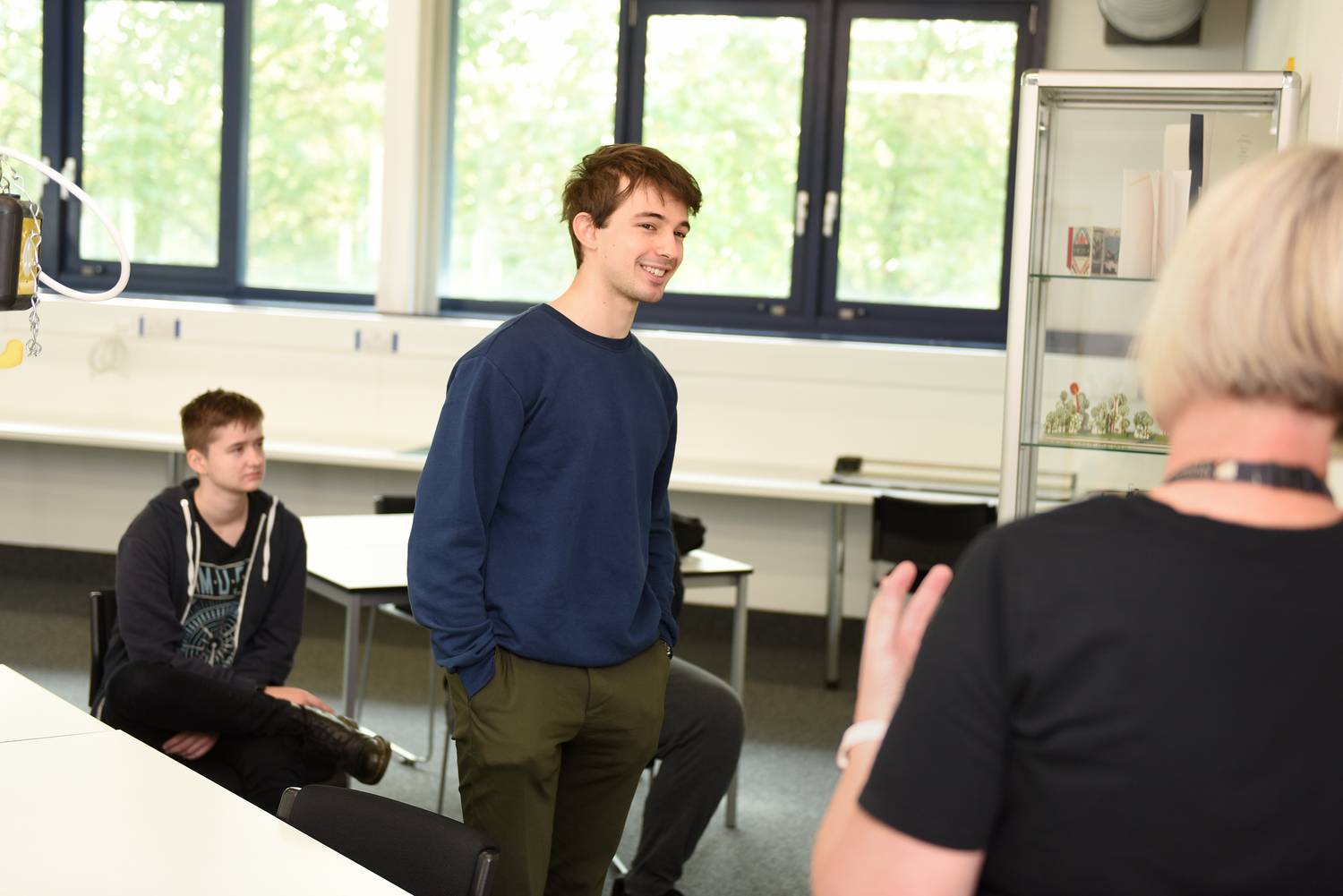 Student standing in seminar