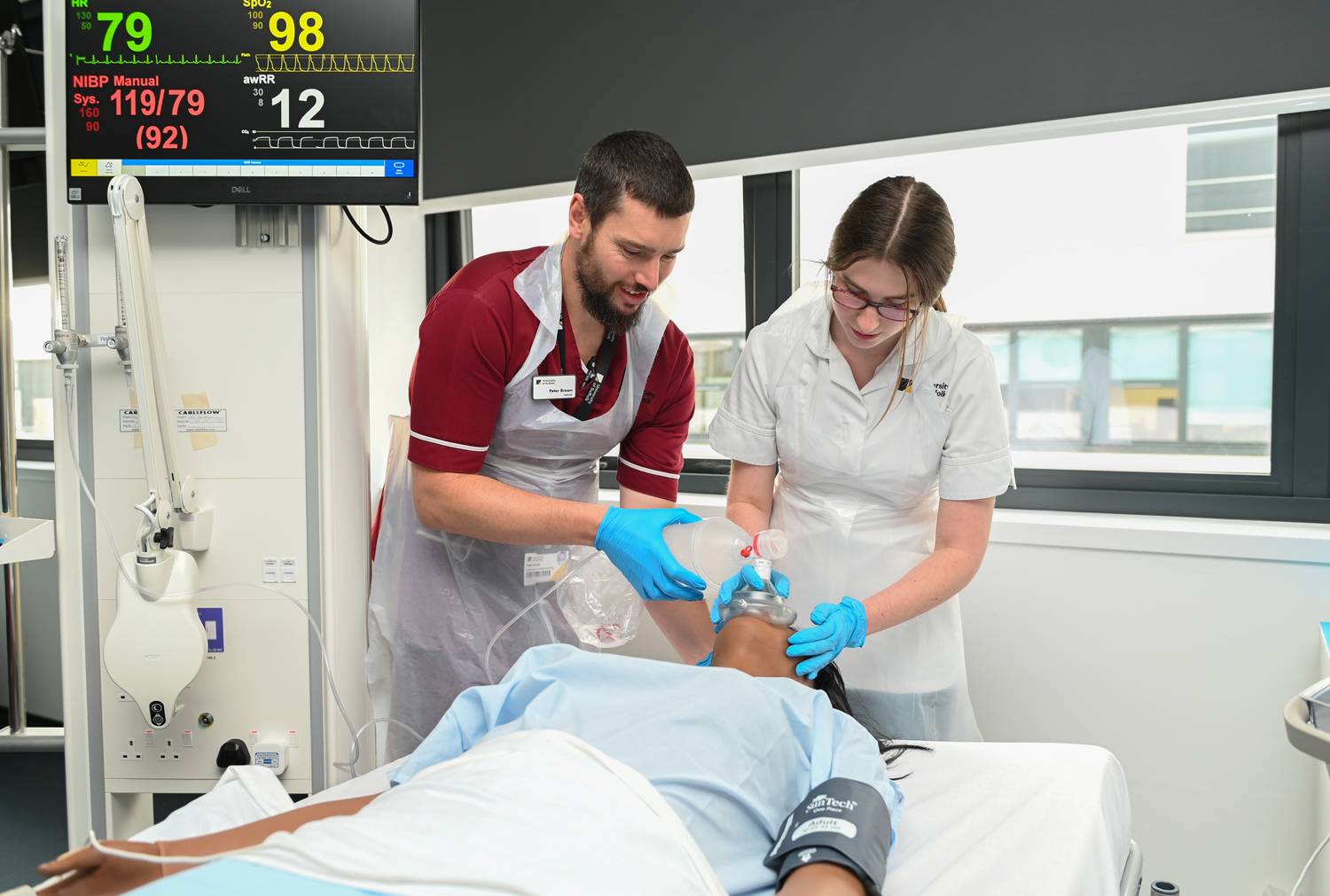 Nurses working on a patient in a simulated ward