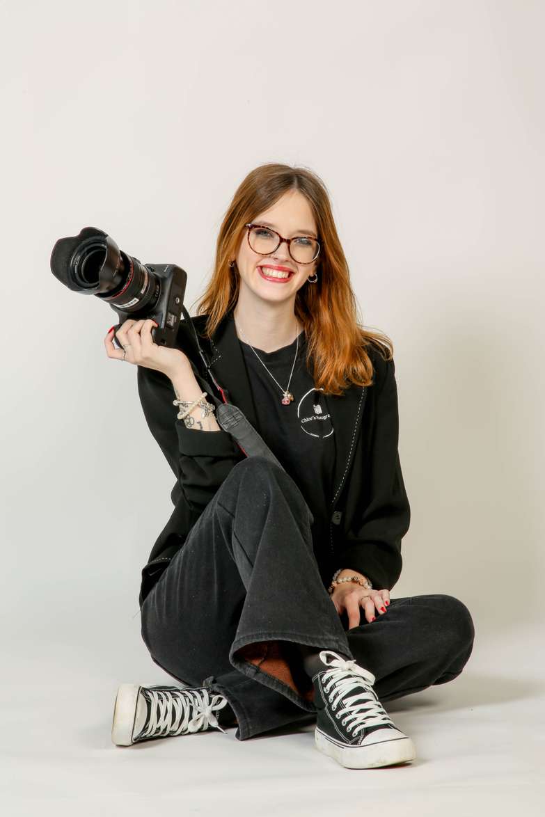 Student Chloe Jenkins with her camera