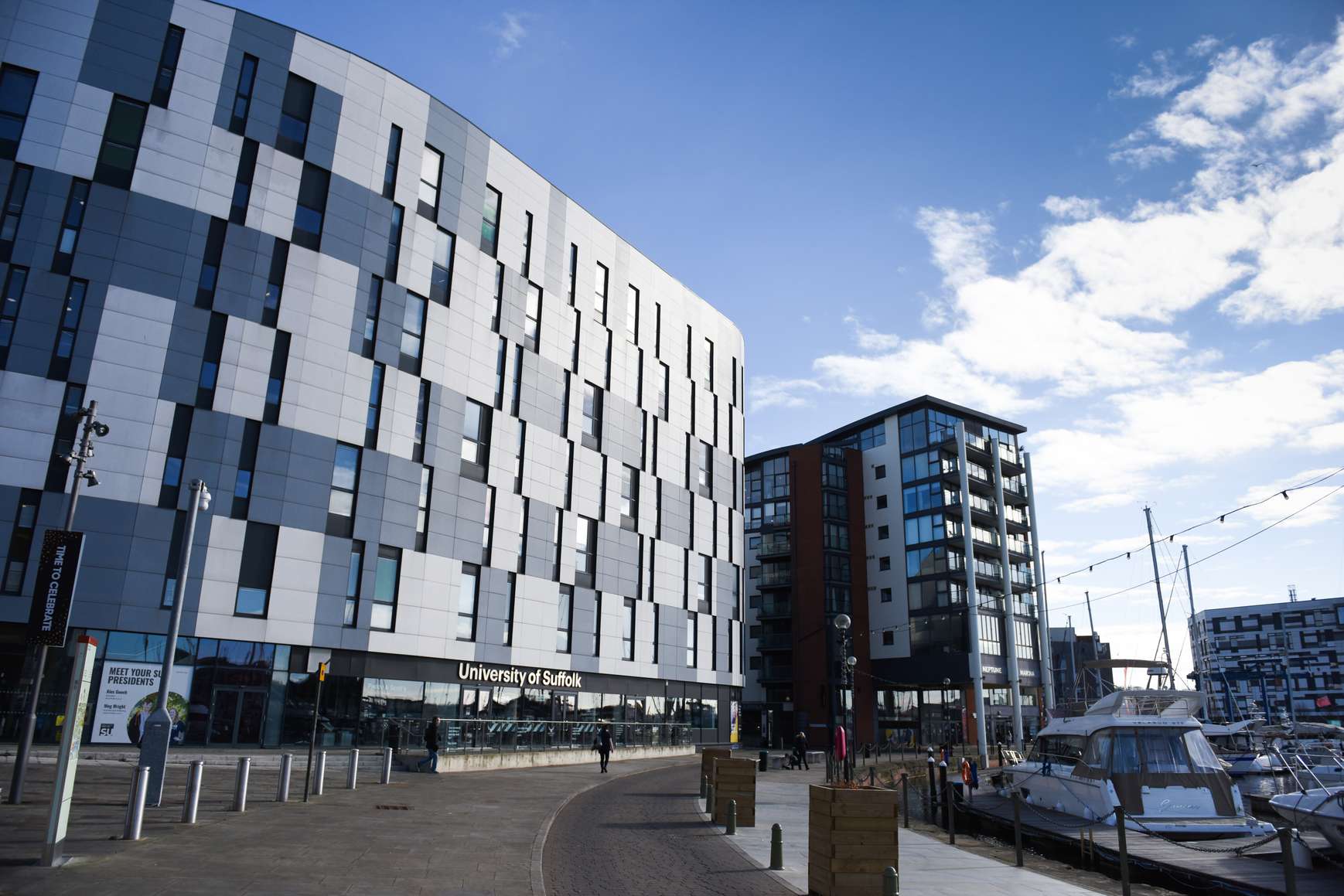 The outside of the Waterfront Building, on the side with the coffee shop