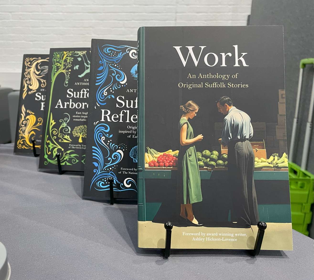 The new book, Work, positioned alongside previous books release by MA Creative and Critical Writing students