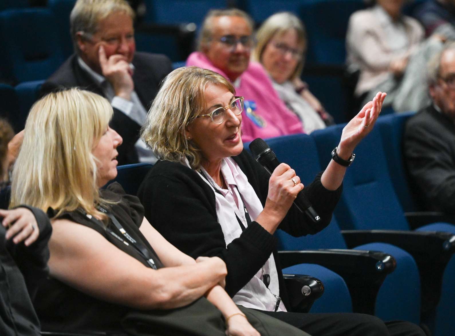 An audience member asking a question at a University of Suffolk Spotlight Suffolk event