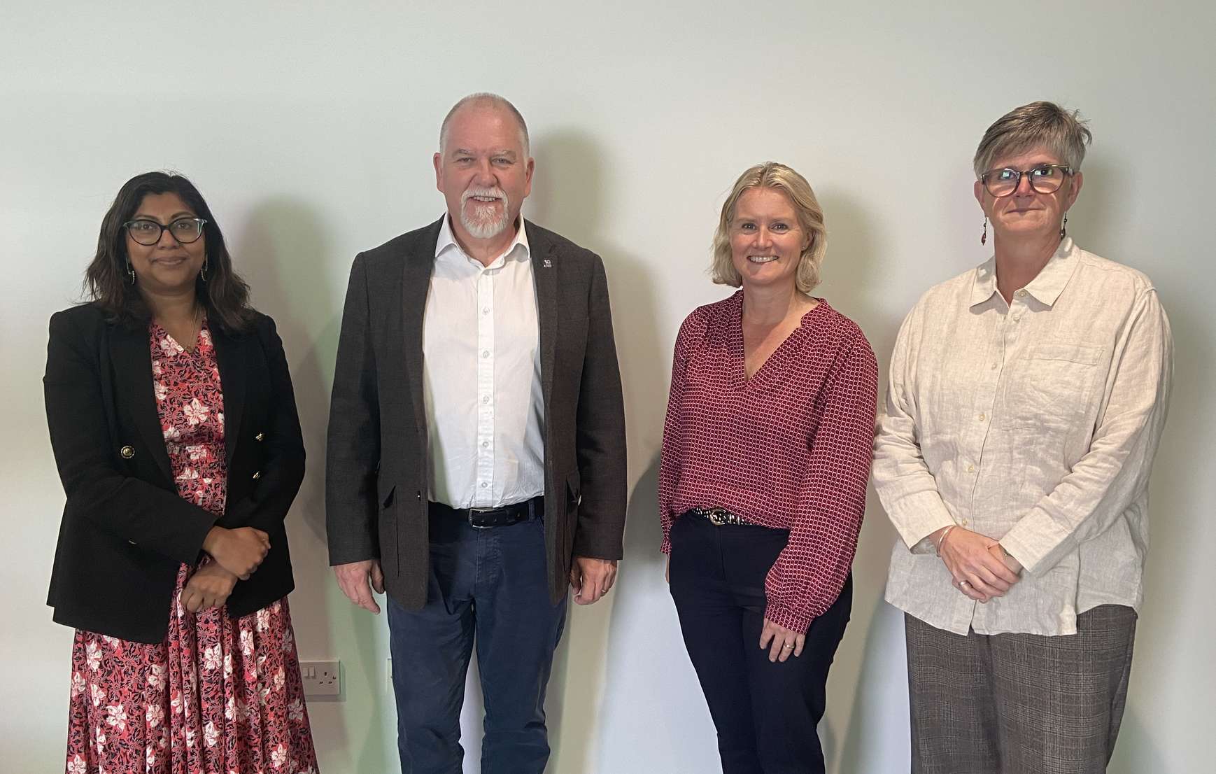 The new board members lined up. Left to right: Sharmila Sylvester, Sean Hickey, Helen Galbraith and Kate Staples