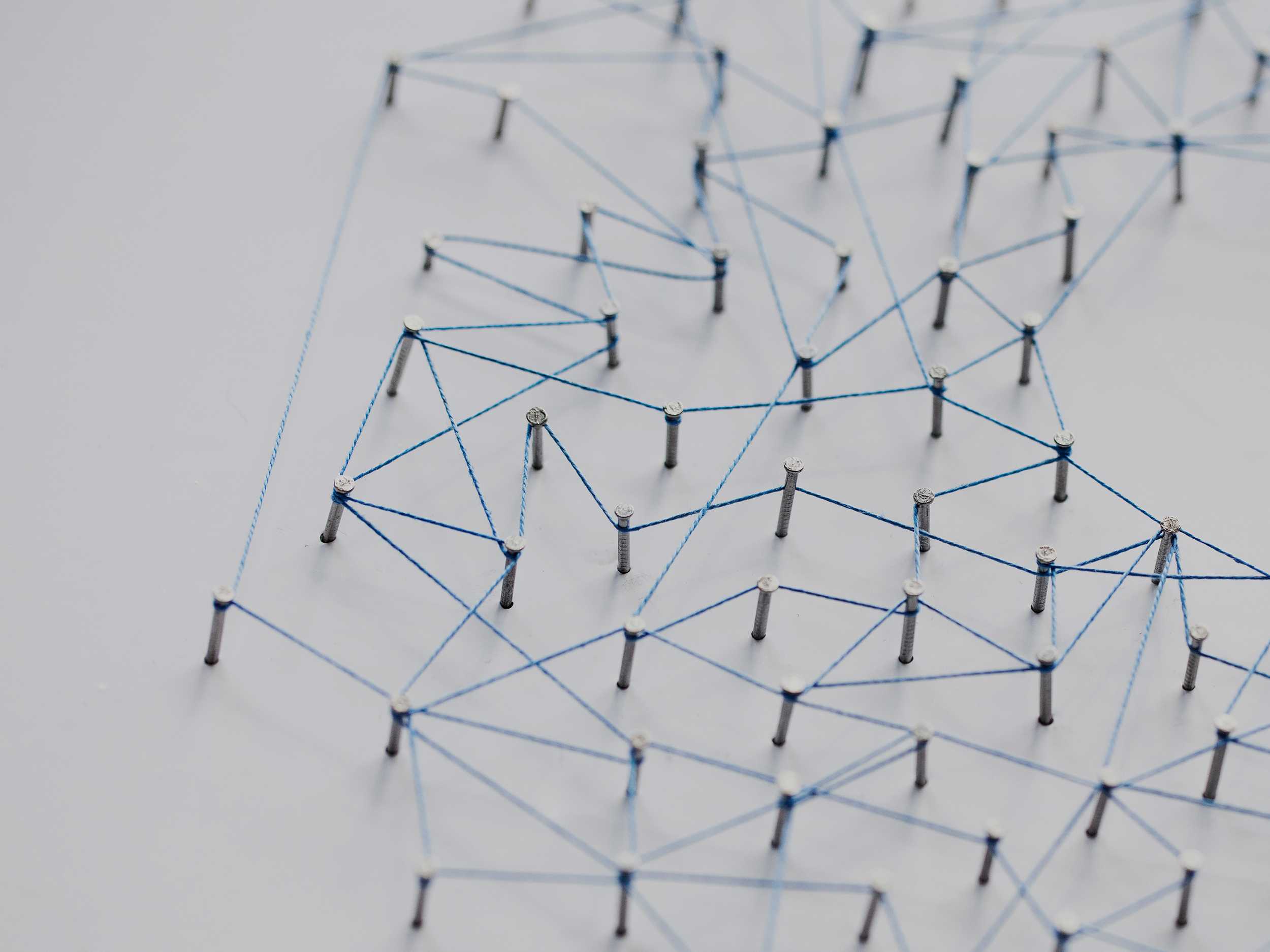Grid of pins connected with string
