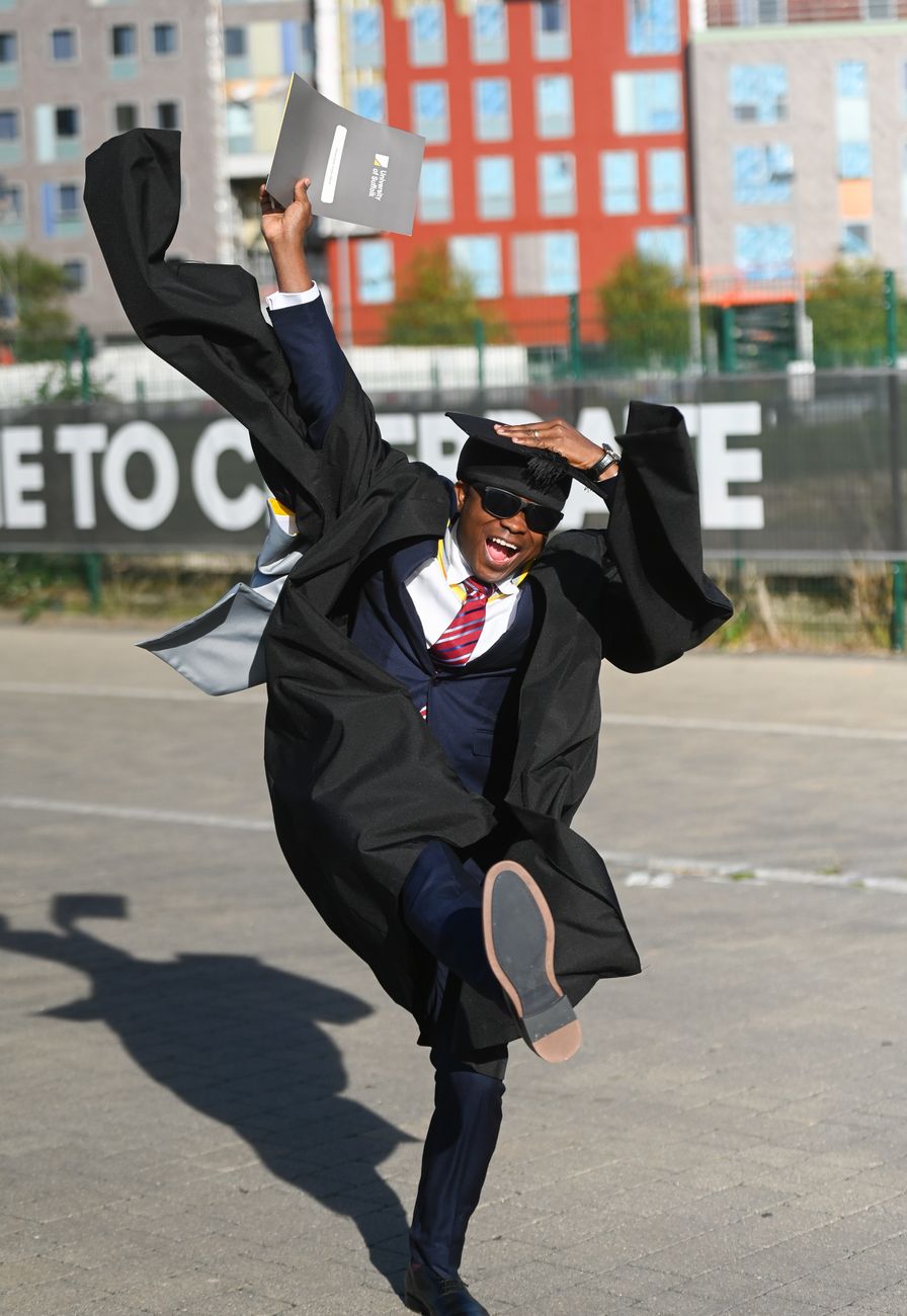 Graduate celebrating