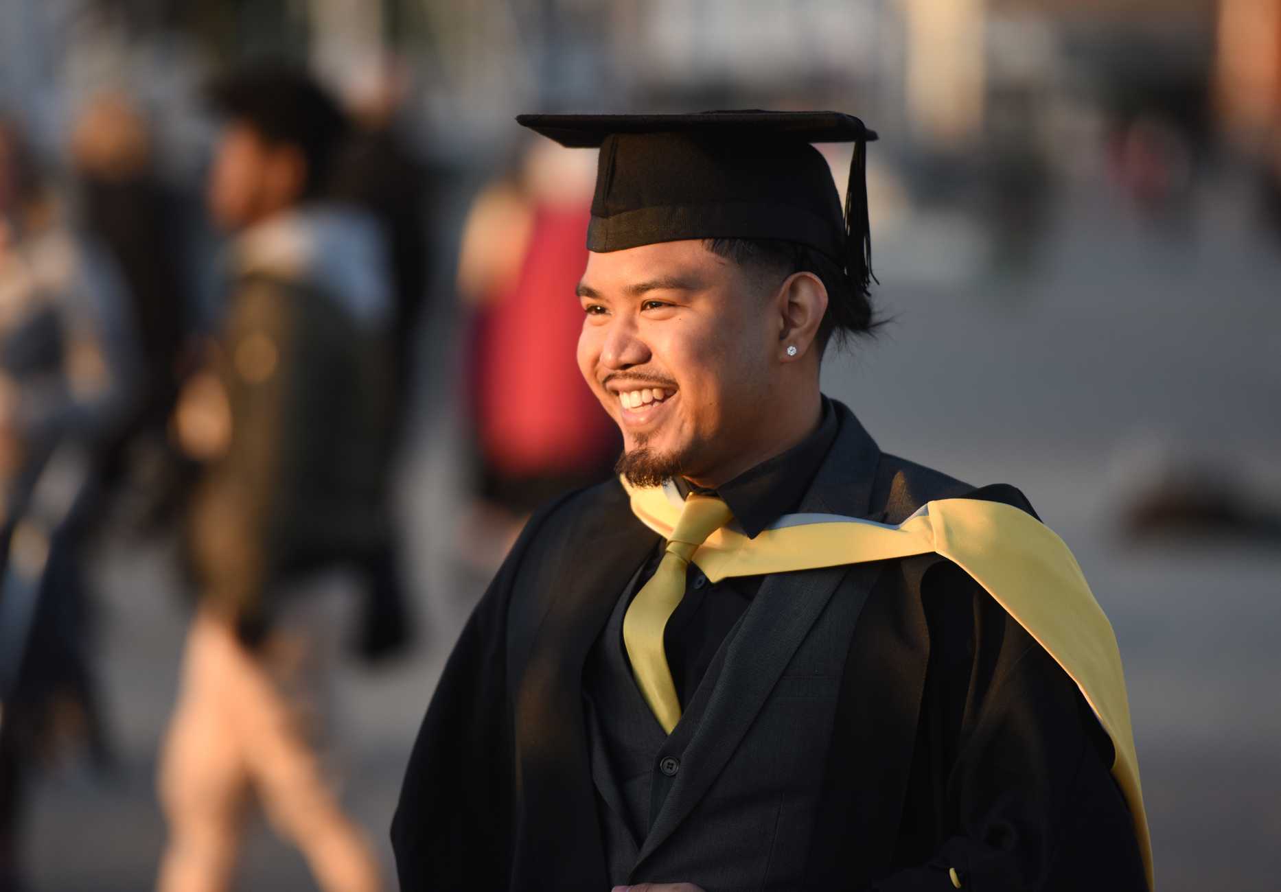 Close-up of student in their cap and gown