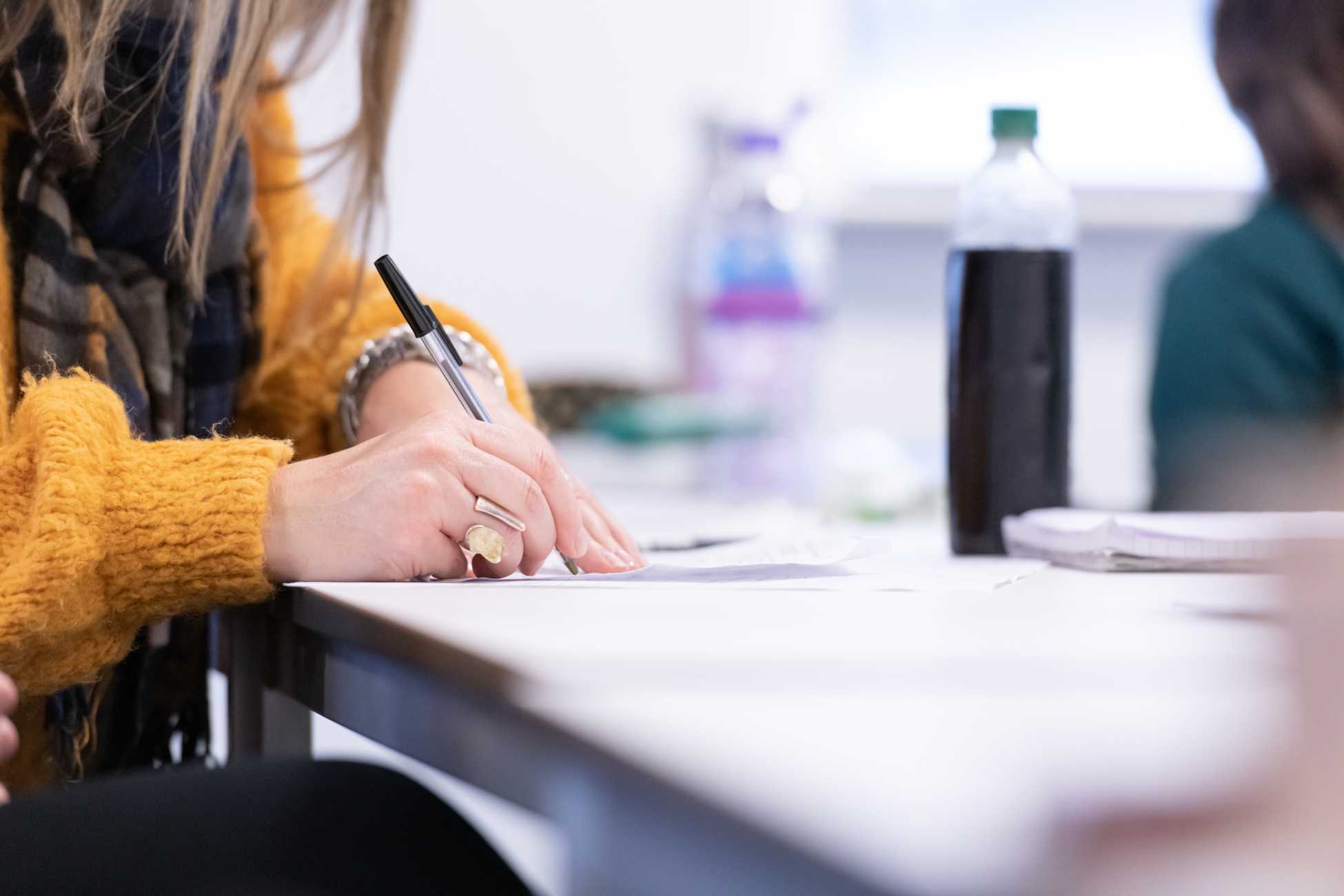 Close-up of a student writing