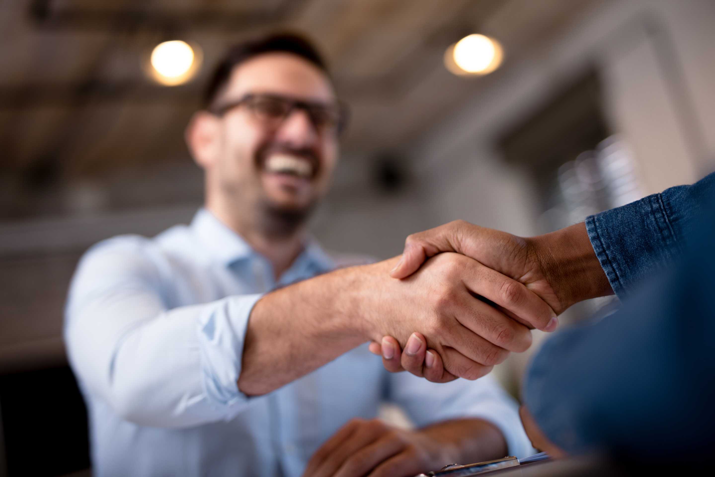Shaking hands with someone