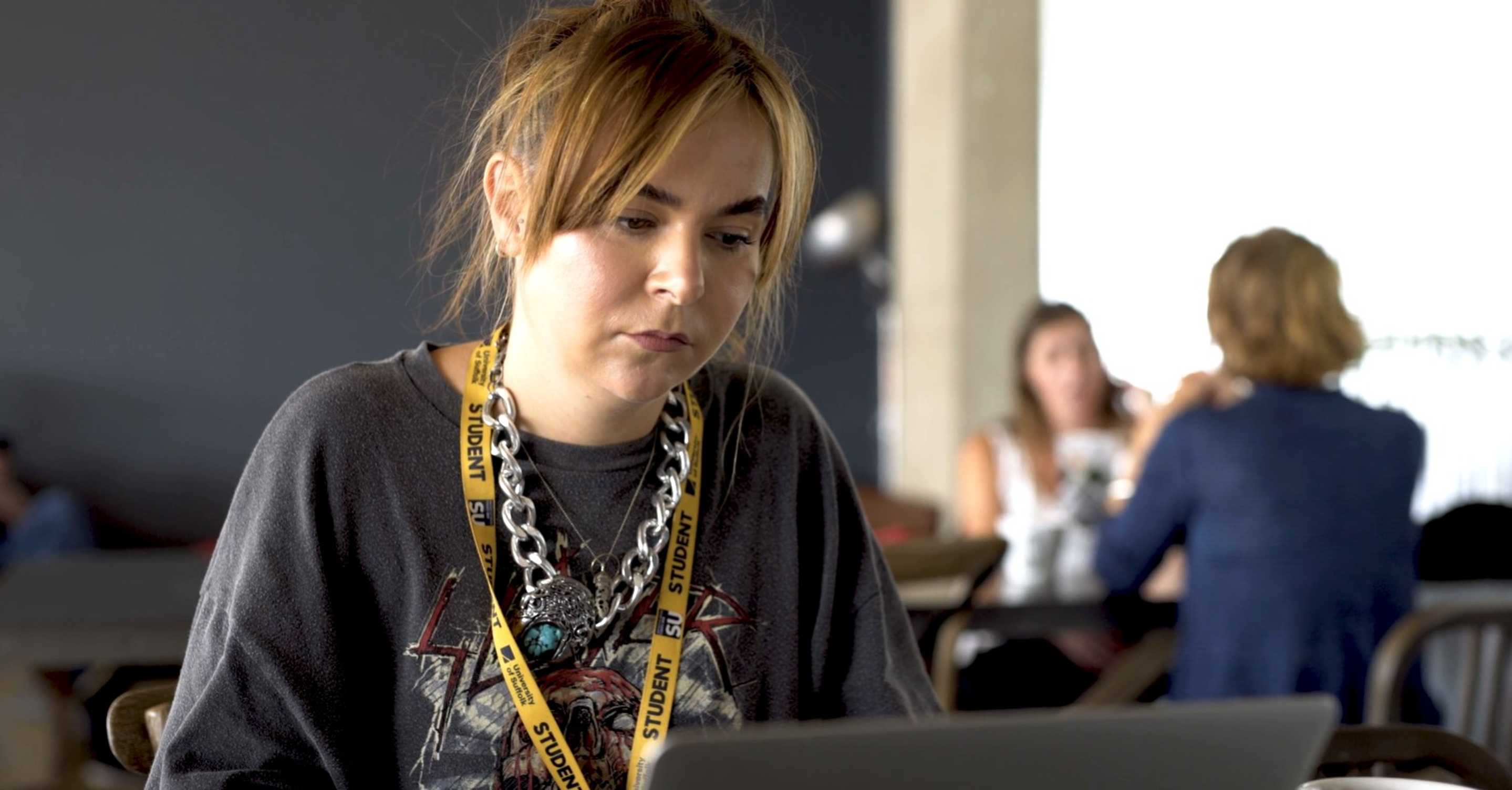 Close-up of student on a laptop