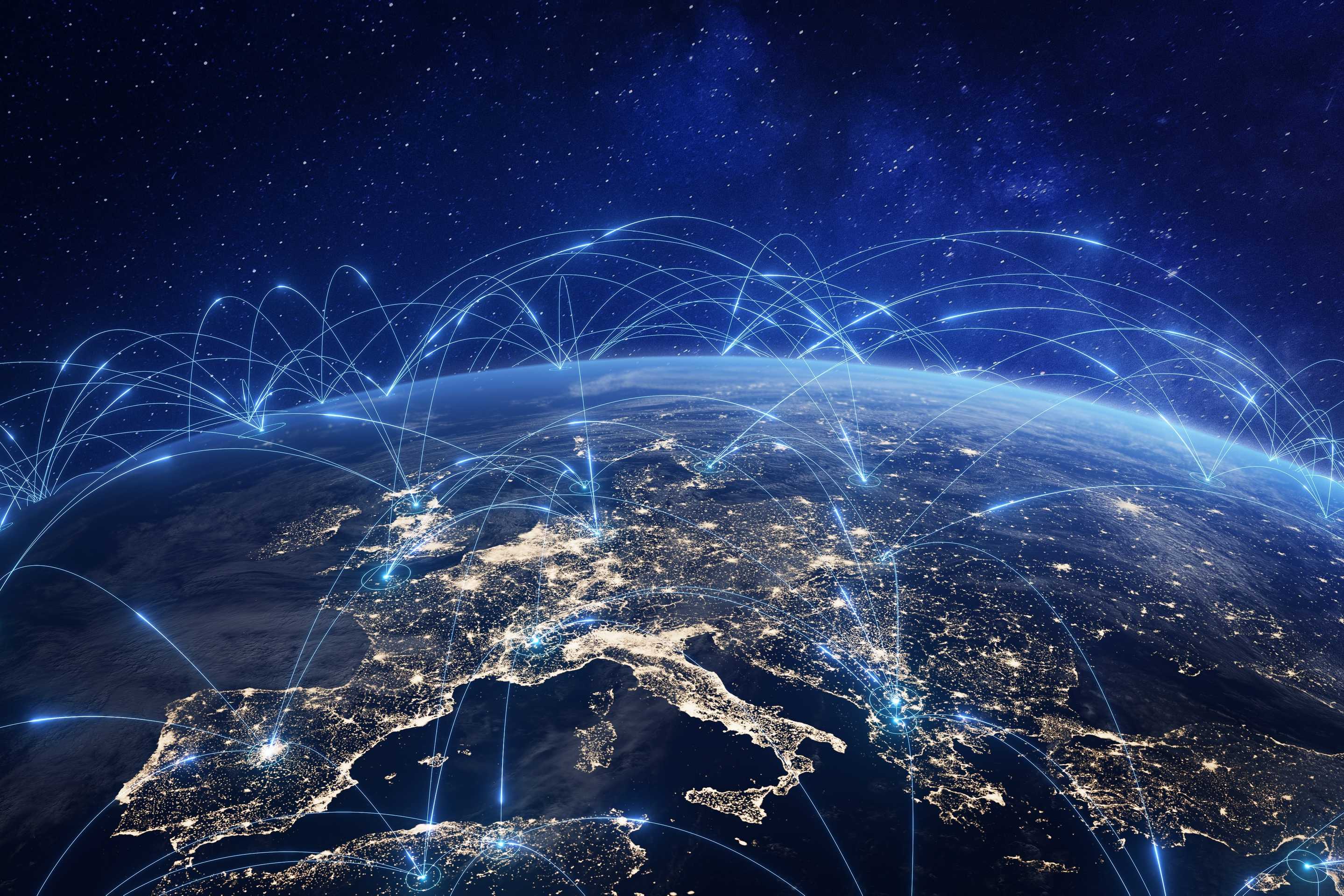Aerial image of Europe with telecommunication links arching from one country to another