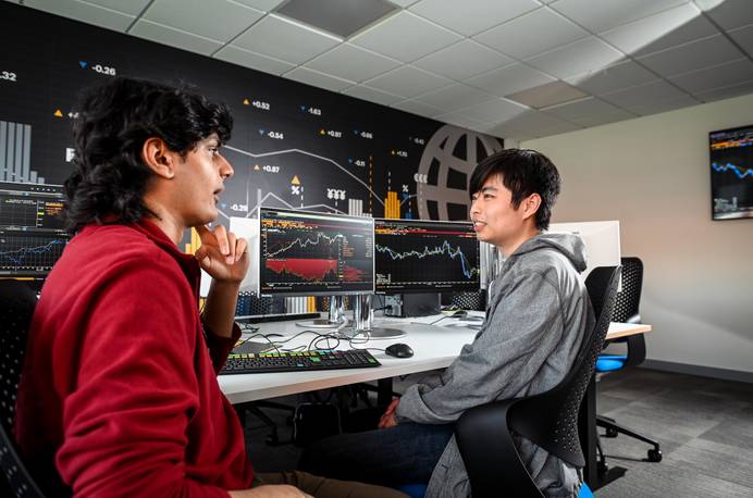 Two students at desk in Bloomberg Lab