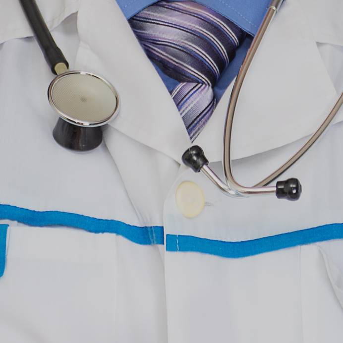 Close-up of healthcare uniform and stethoscope