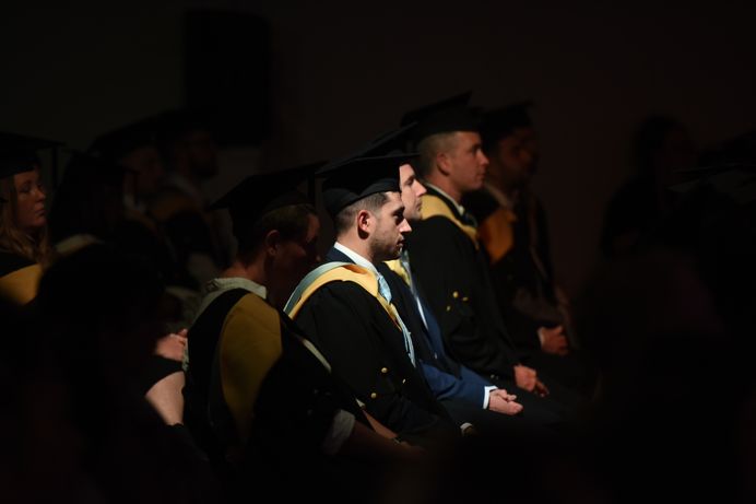 Students sitting in a graduation ceremony