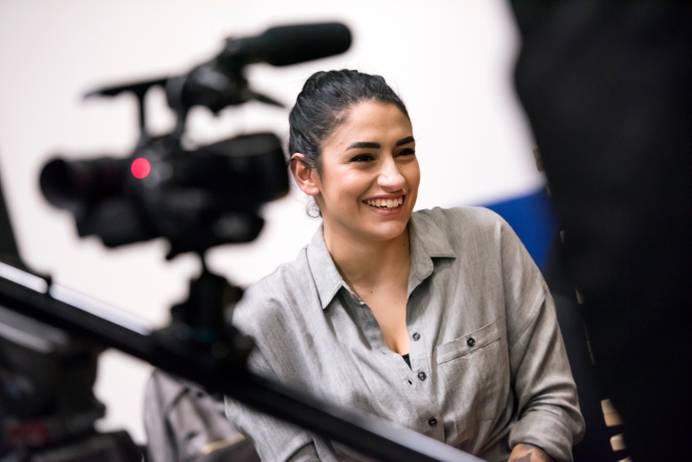 Close-up of a student being filmed