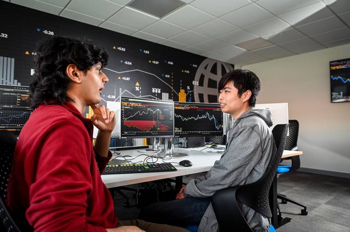 Two students at desk in Bloomberg Lab