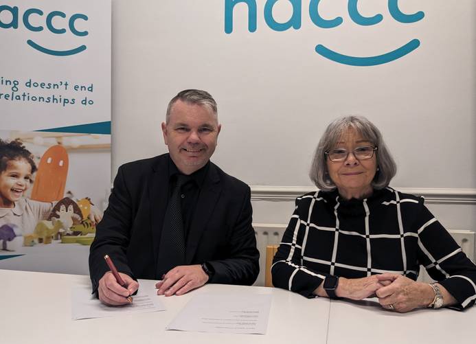 From L-R: Stuart Agnew, Associate Professor, Director, The Centre for Academic and International Partnerships, University of Suffolk, and Elizabeth Coe, CEO of NACCC, signing the Memorandum of Understanding.