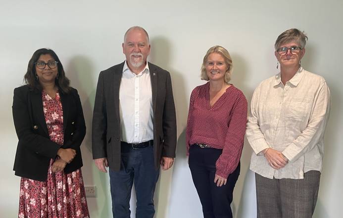 The new board members lined up. Left to right: Sharmila Sylvester, Sean Hickey, Helen Galbraith and Kate Staples