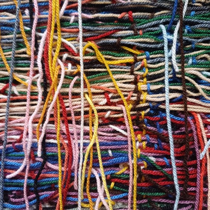 Multi-coloured woven wool tapestry