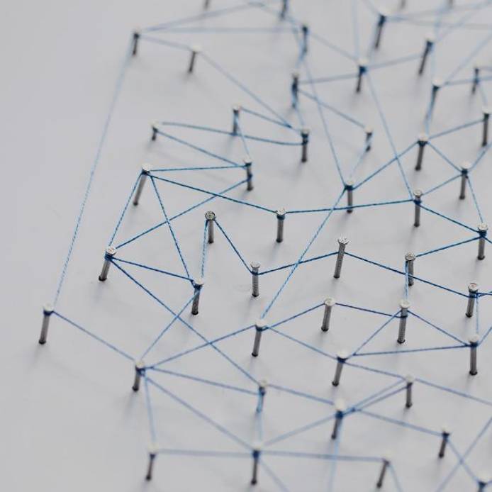 Grid of pins connected with string