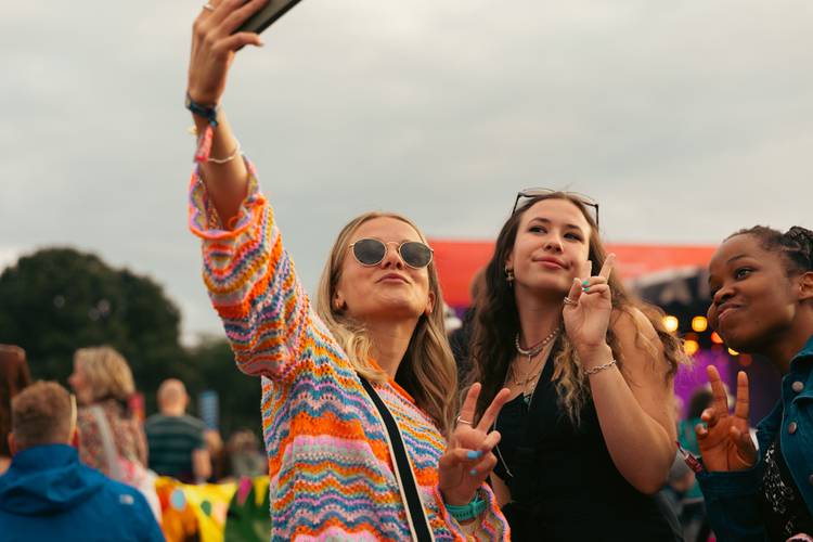 Students taking a selfie at the Latitude festival