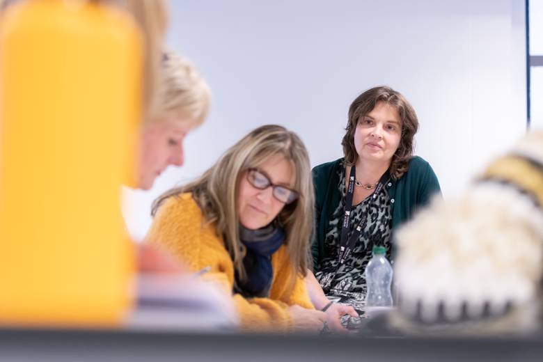 A students and lecturer in a seminar