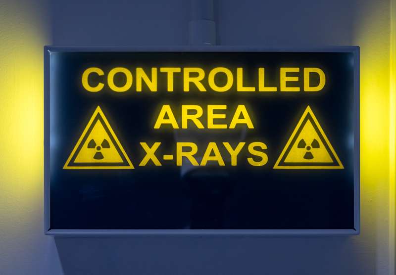 Close-up of x-ray area warning sign