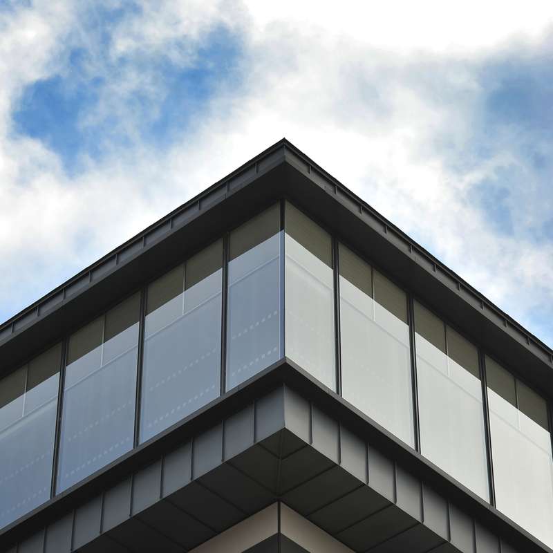 Close-up of top floor of the James Hehir Building