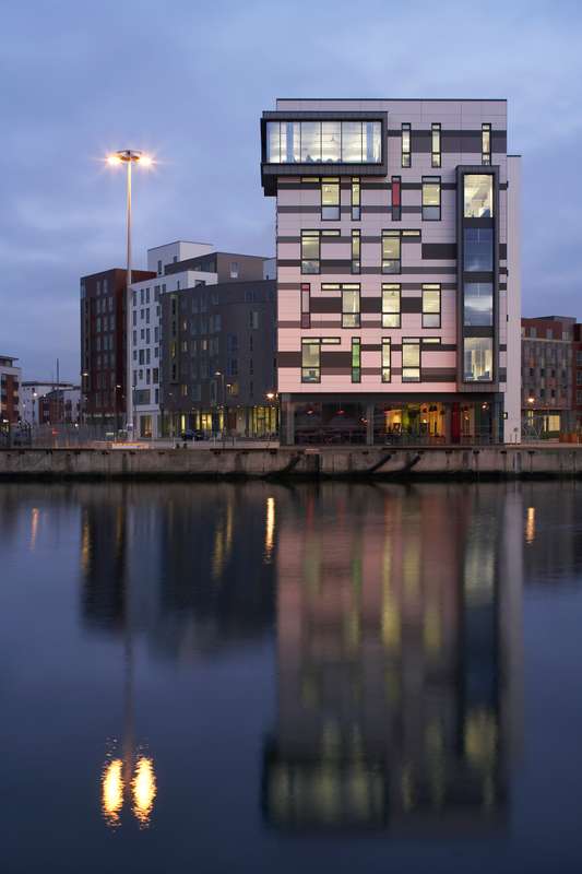 James Hehir Building with reflecting in the water