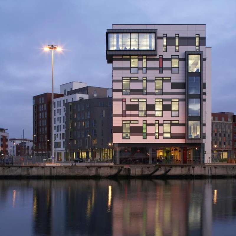 James Hehir Building with reflecting in the water
