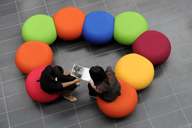 Students sitting on chairs