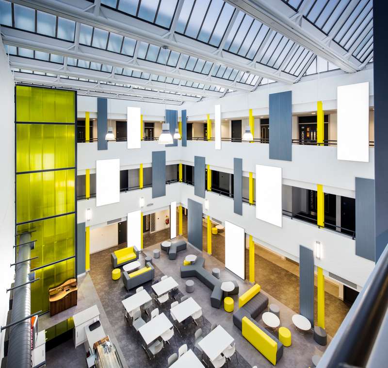 Chairs, tables and rooms inside the Atrium building