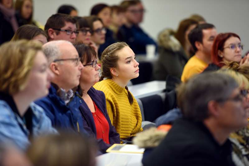 Parents and students sitting in a lecture theatre