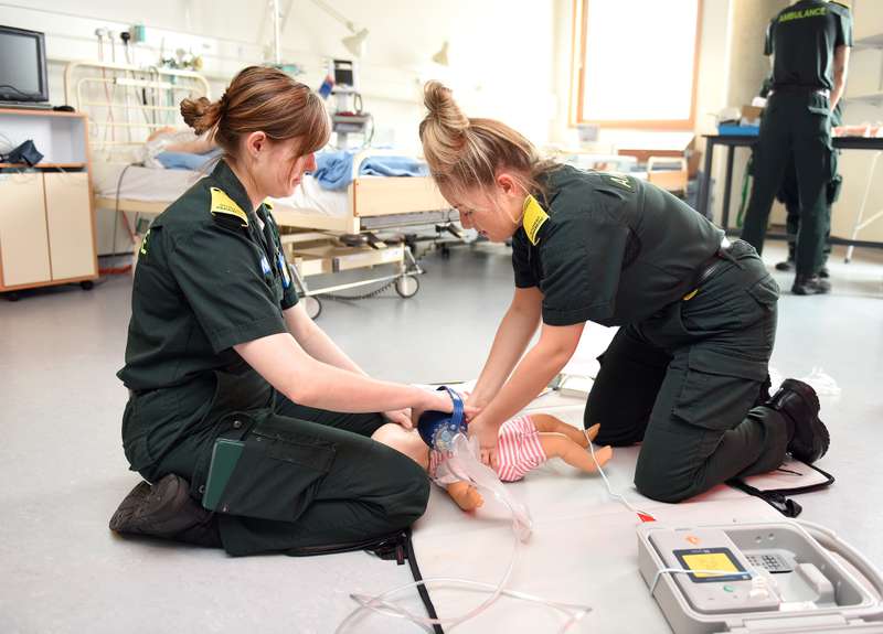 Students using a manual resuscitator bag