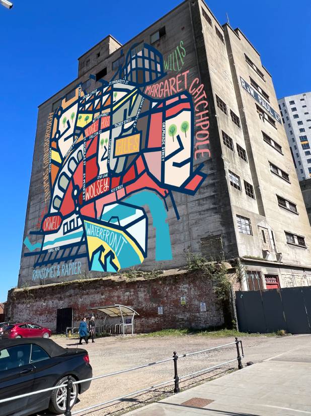 An illustration created by Sammi Wong superimposed on an image of Paul's silo in Ipswich