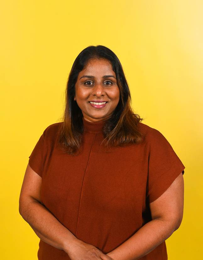 A head and shoulders photo of BA (Hons) Architecture Course Leader Aishani Jayasinghe, smiling