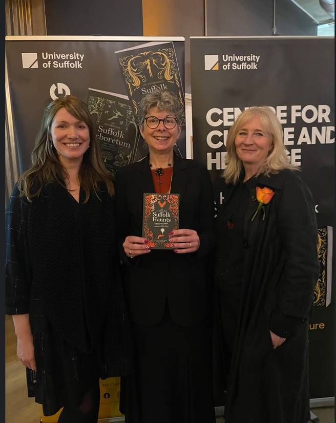Left to right: Dr Lindsey Scott, Sarah Waterson and Dr Amanda Hodgkinson at the launch event. Sarah holds a copy of Suffolk Haunts
