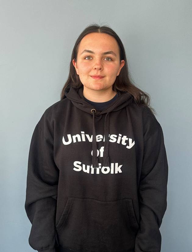 Physiotherapy student Flo Durrant, wearing a University of Suffolk hoodie